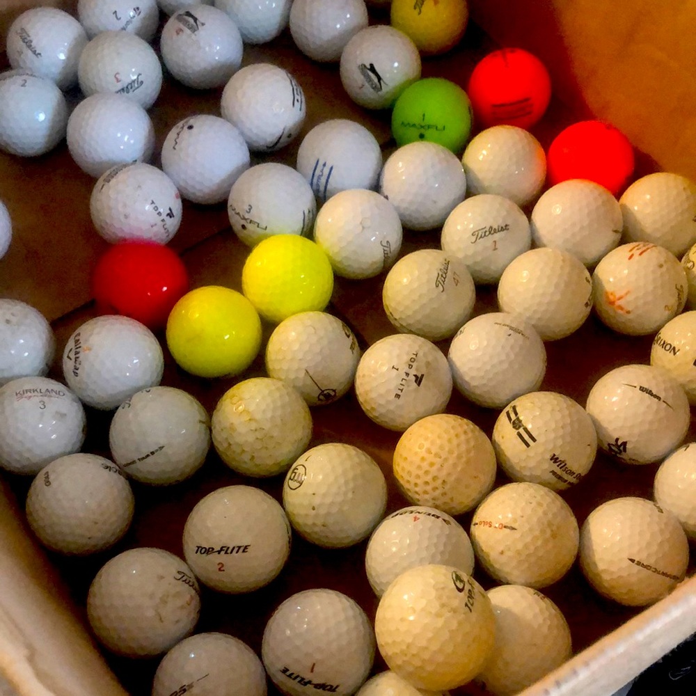25 golf balls some new some refurbished